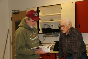 Ray Berry showing  his book